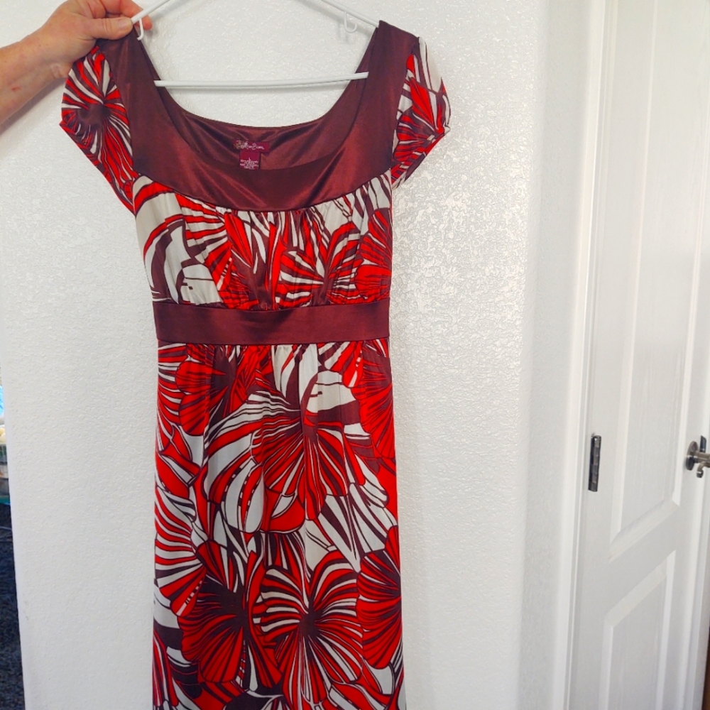 Miss Bisou dress with cap sleeves and tie in the back size large